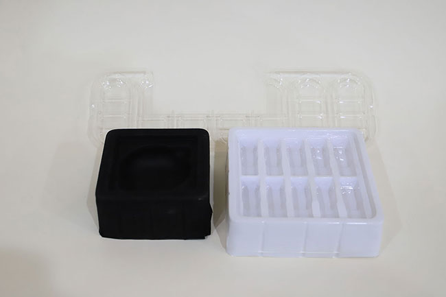Plastic trays with many kinds of colors for different shapes of chocolate packaging in the following